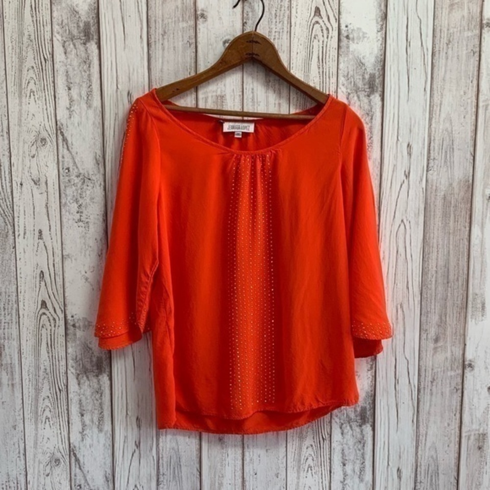 Jennifer Lopez orange open sleeve top size…